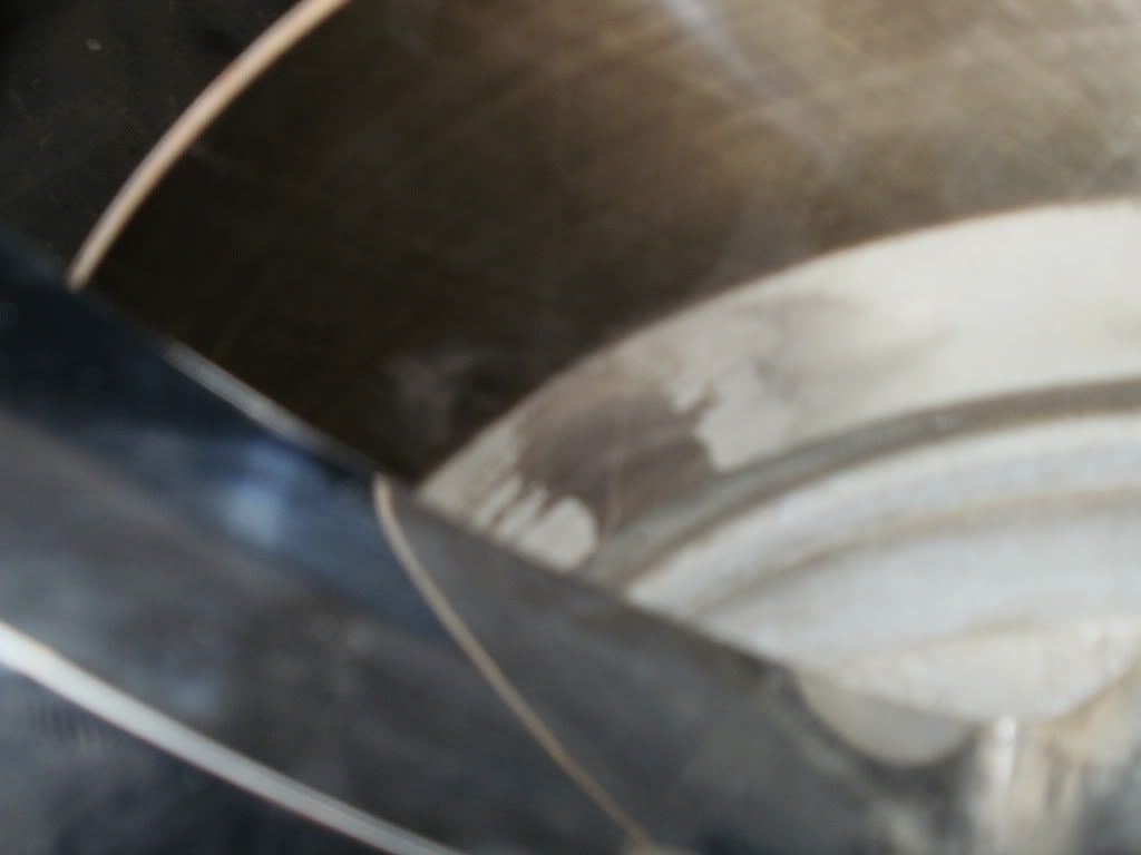 (Pics )The ceramic portion under the rotor when scratched off looks